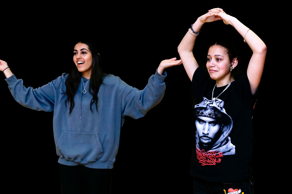 Two girls rehearsing